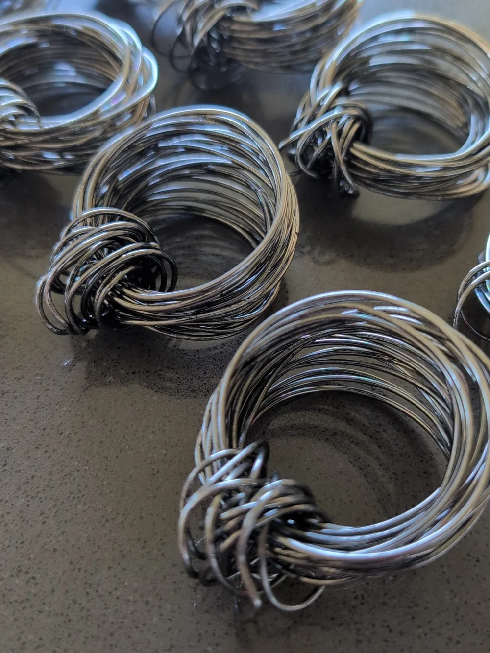 Set Of 8 Handwoven Wire Napkin Rings
